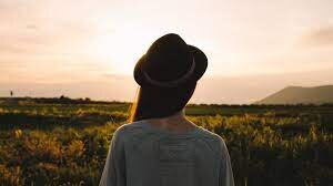 Woman looking at field
